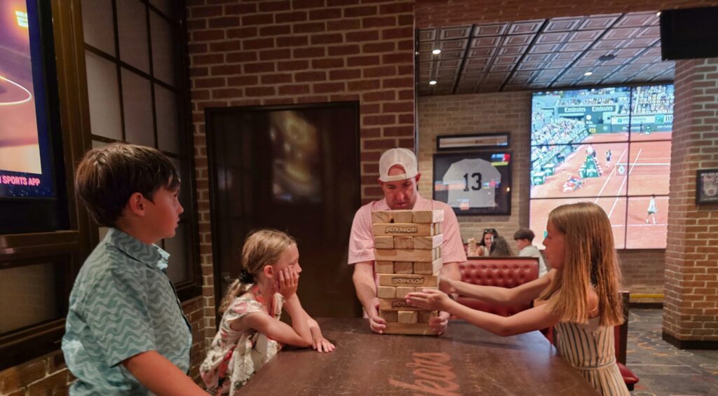 Playing Jenga at Playmakers on Freedom of the Seas