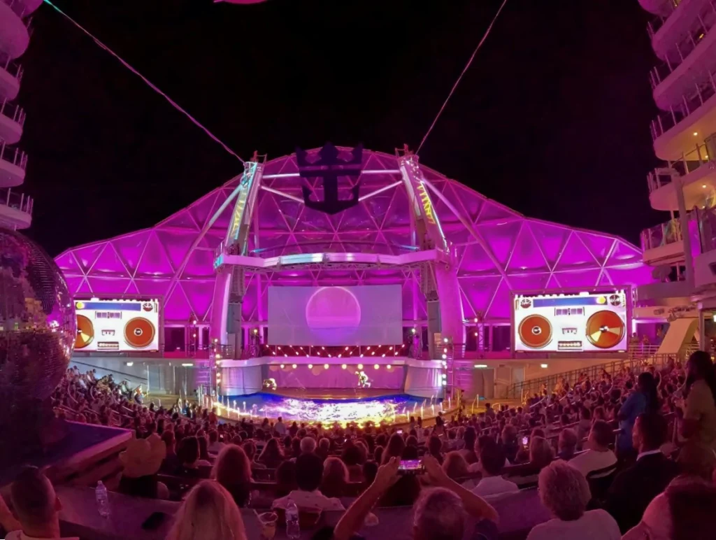 Divers performing in the AquaTheater on Utopia of the Seas